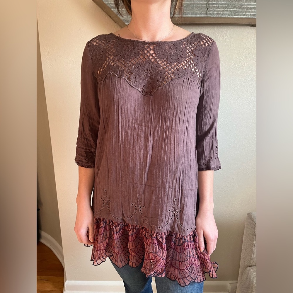 Brown Free People tunic with crochet neckline and mesh design at sweep